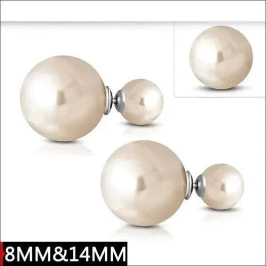 Aramat Jewels double pearl stud earrings featuring a large and small cream-colored synthetic pearl in steel