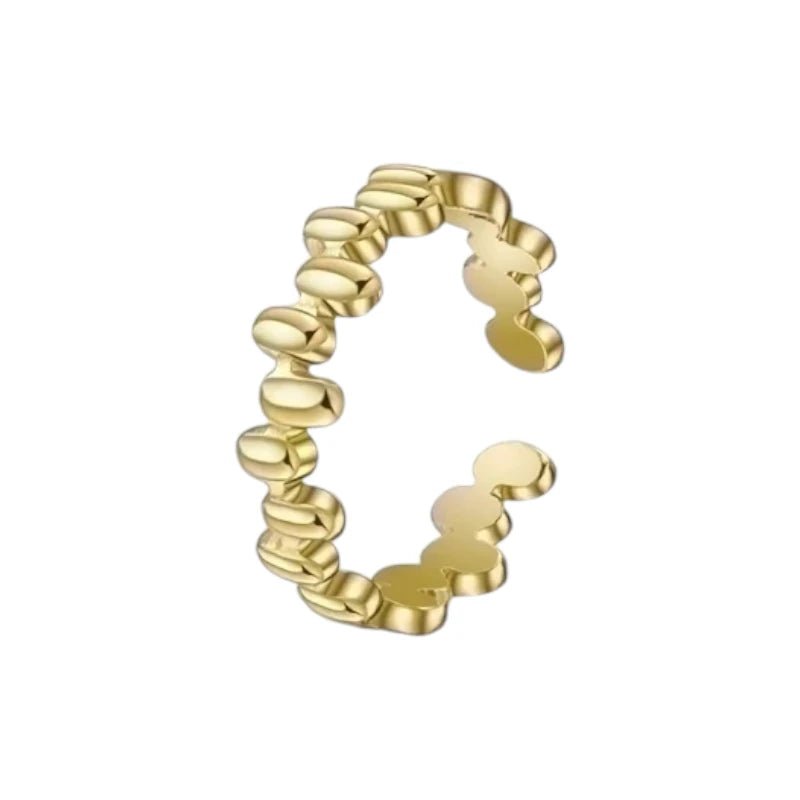Aramat Jewels gold-colored stainless steel adjustable ring featuring a textured oval block pattern, 6mm wide.
