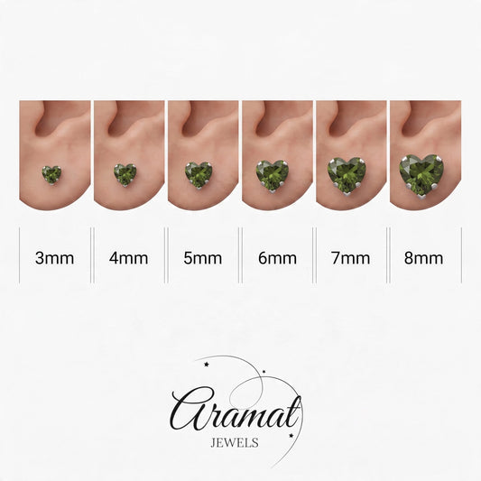 Aramat Jewels olijfgroene hartjes oorstekers van RVS met zirkonia in verschillende maten van 3 tot 8 mm.
