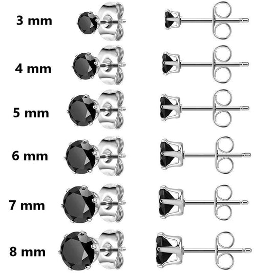 Een set oorbellen met zwarte diamanten