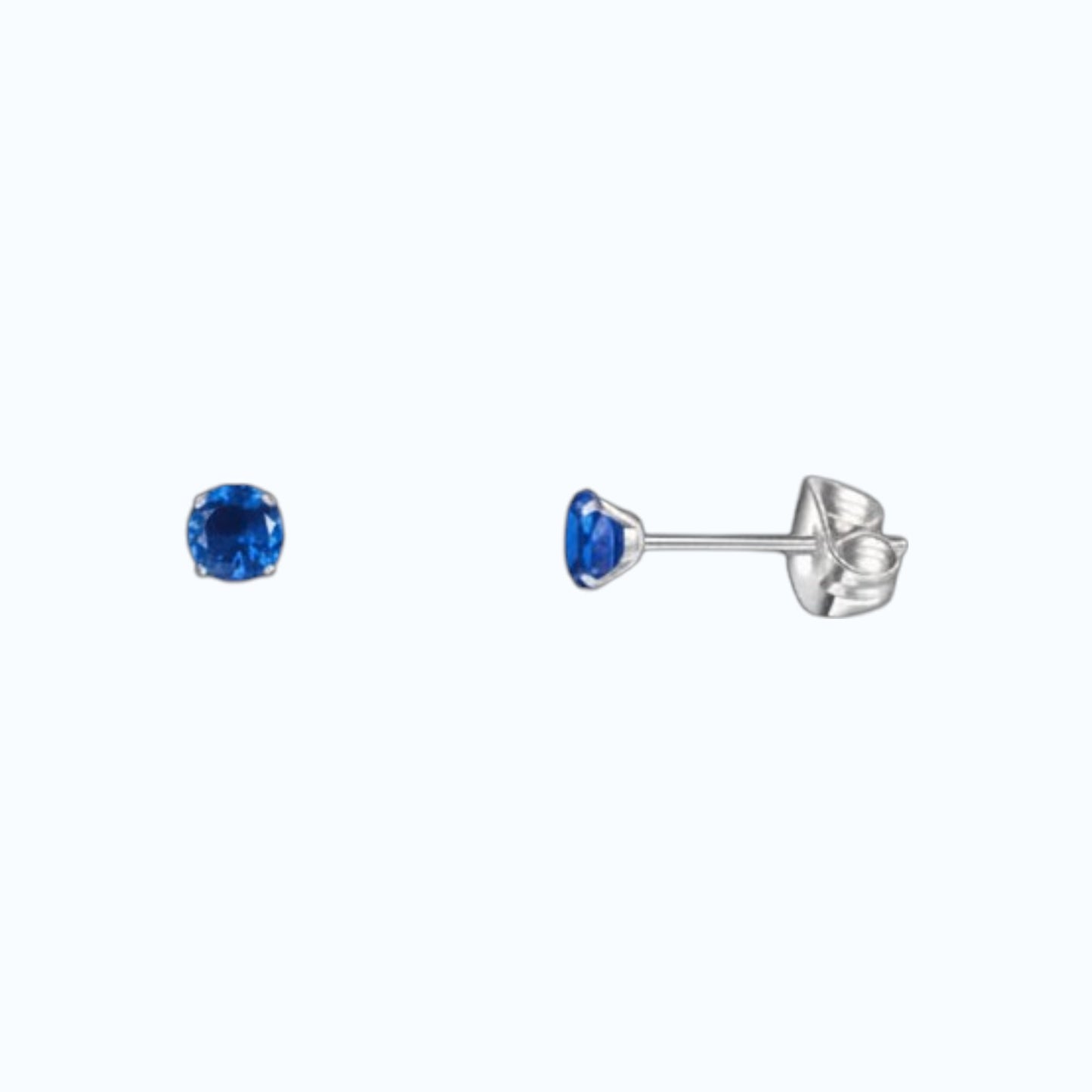 Boucles d'oreilles en titane avec zircon bleu foncé