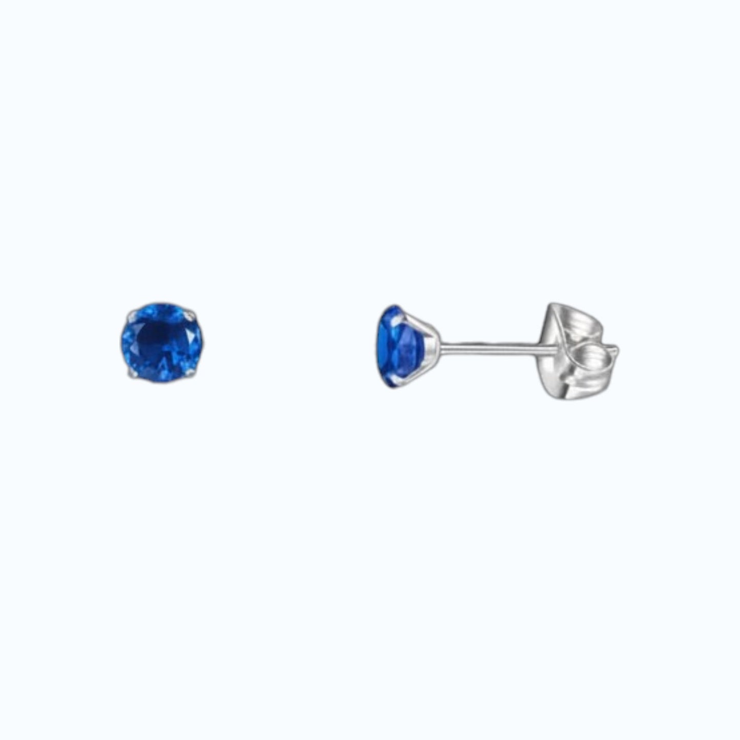 Boucles d'oreilles en titane avec zircon bleu foncé