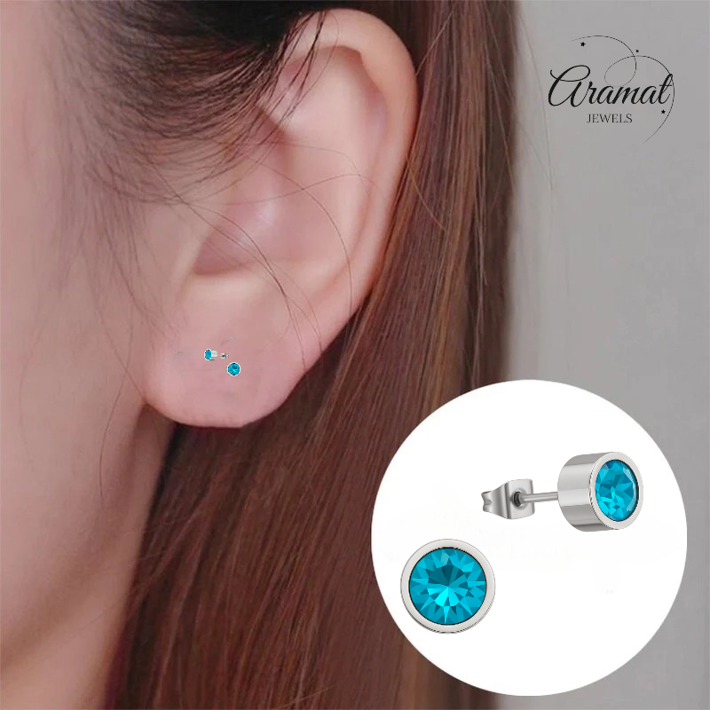 Aqua blauwe kristal oorstekers – 5mm zilver RVS