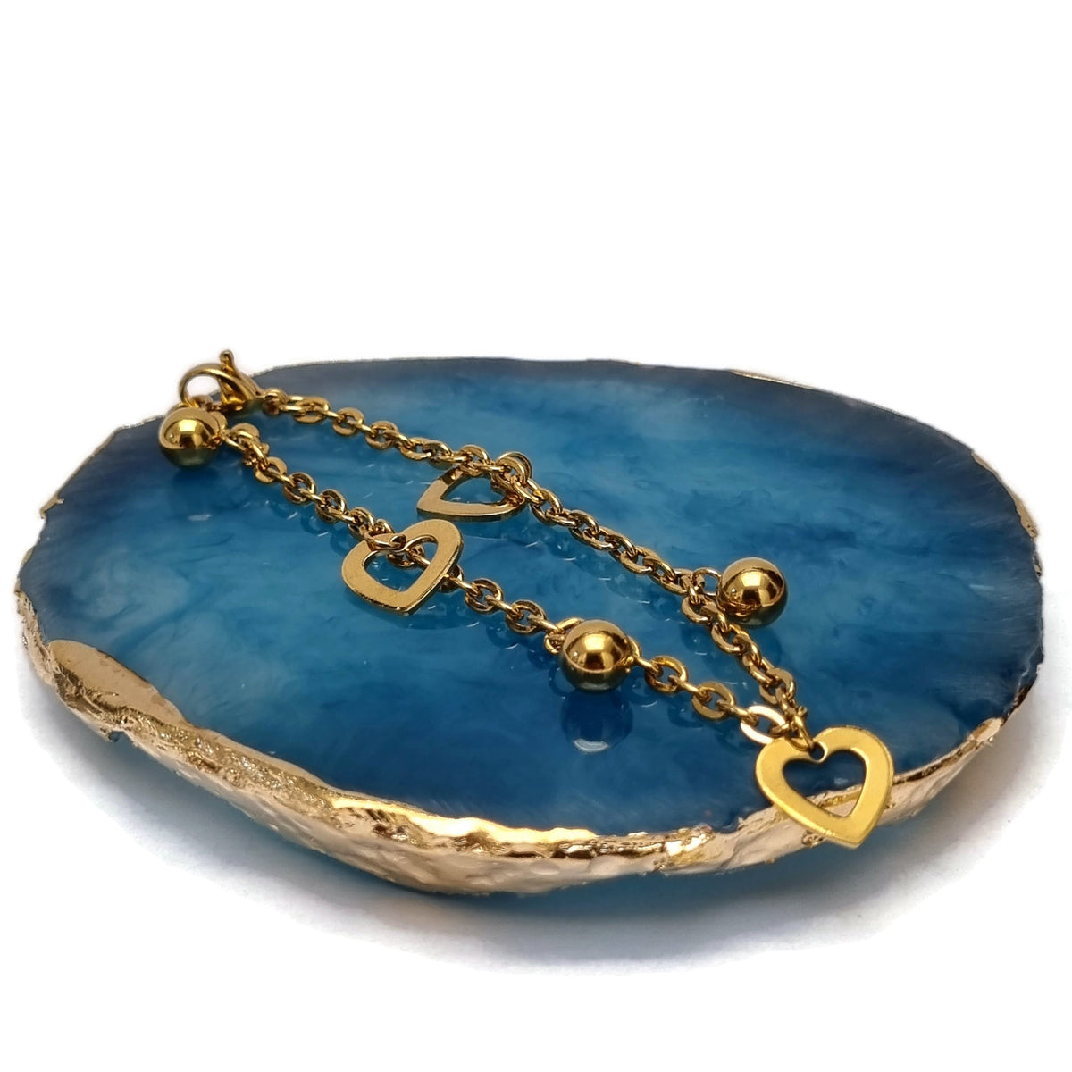 Gouden Plaat Met Blauwe Agaat En Gouden Hart In Stalen Bedelarmband Met Hartjes.