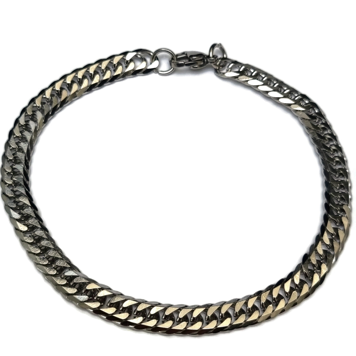 Een Zilveren Armband Met Een Ketting Van De Dubbele Gourmet Armband Van Staal.