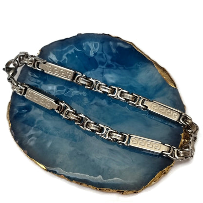 Koningsschakel Armband Van Grieks Staal Met Zilveren Lepels Op Blauwe Agaat.