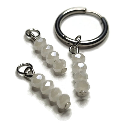 Zilveren Oorringen Met Witte Facetgeslepen Kwartskralen - Aramat Jewels®.
