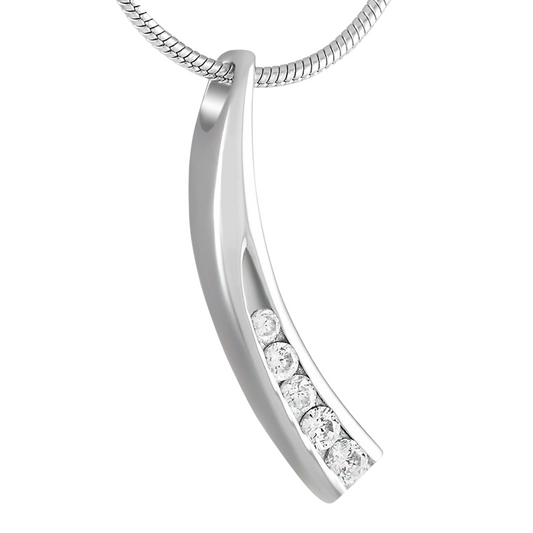 Elegant curved cremation pendant with zirconia – steel