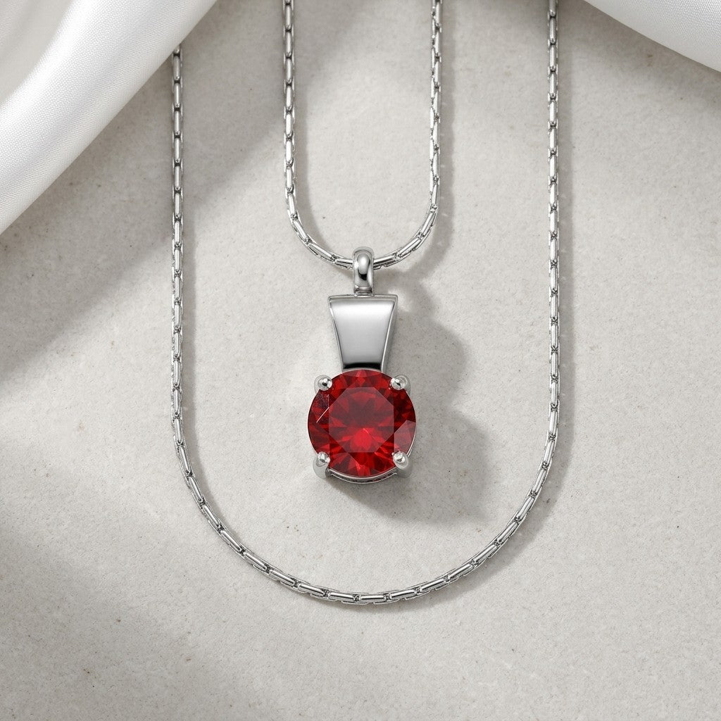 Aramat Jewels zilverkleurige RVS ashanger met rode zirkonia, 28x12mm, waterbestendig gedenksieraad.
