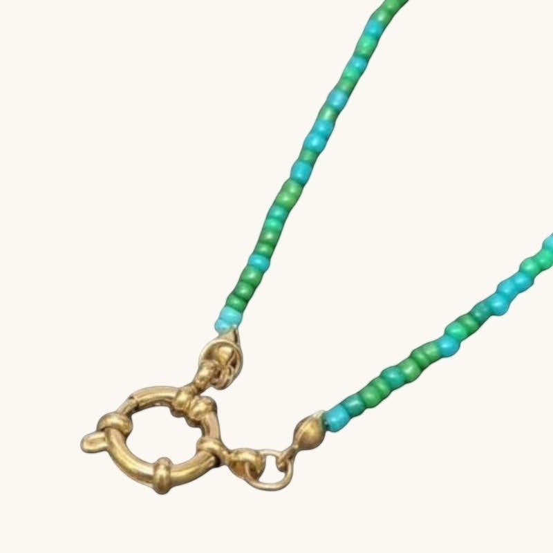 Aramat Jewels beaded necklace with blue and green seed beads and a gold-tone toggle clasp.