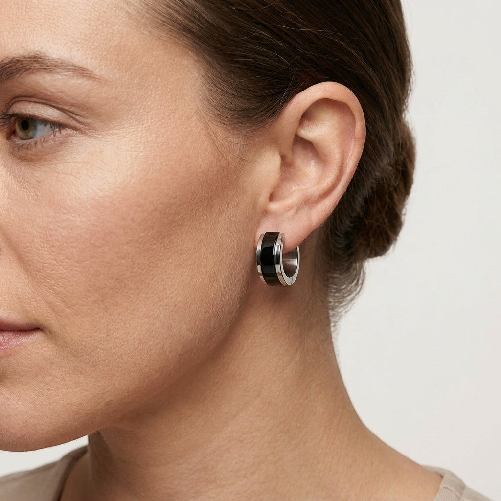 Aramat Jewels bicolor stainless steel hoop earrings with a glossy black and silver finish, 13x7mm.