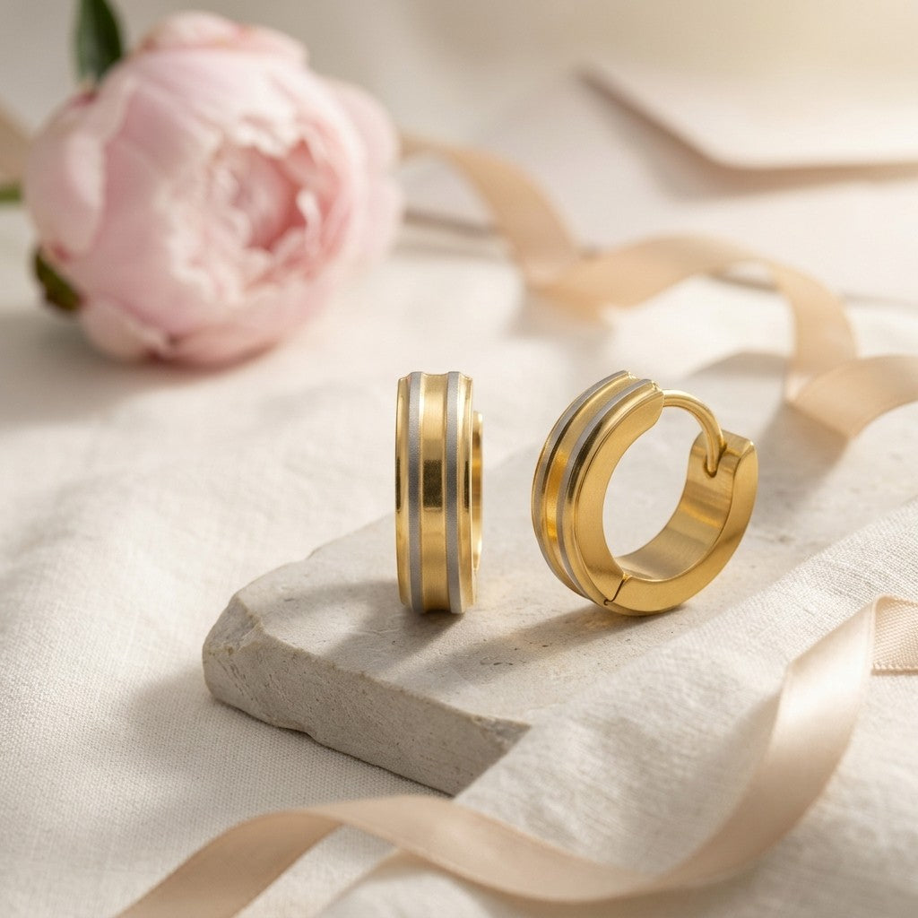Aramat Jewels bicolor stainless steel hoop earrings with matte silver and gold stripes, 13mm.
