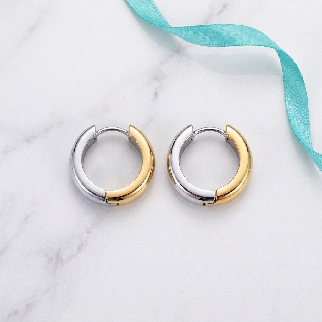 Aramat Jewels bicolor stainless steel hoop earrings, gold and silver finish, 13mm or 20mm diameter, 7mm wide, glossy.