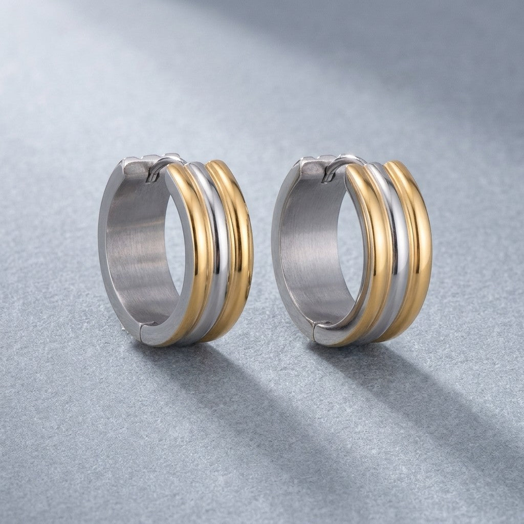 Aramat Jewels bicolor stainless steel hoop earrings with gold and silver stripes, 13mm diameter.