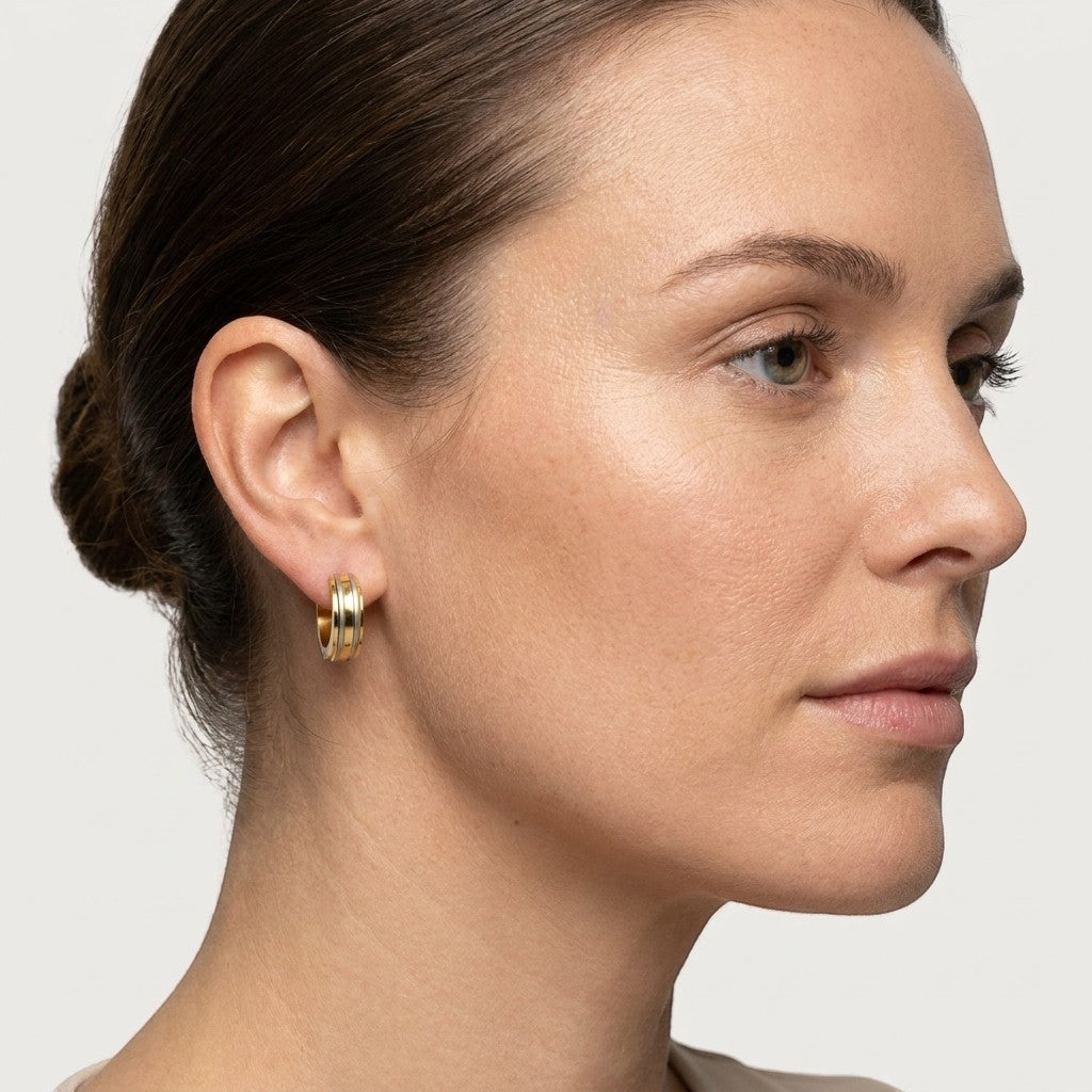 Aramat Jewels bicolor matte silver hoop earrings with gold stripes, 13mm, made of stainless steel.