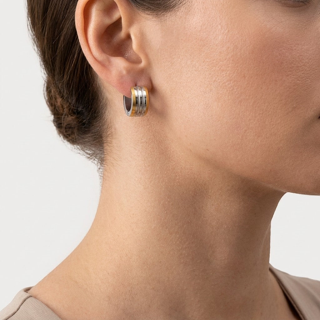 Aramat Jewels bicolor stainless steel hoop earrings with matte stripes, 13mm diameter.