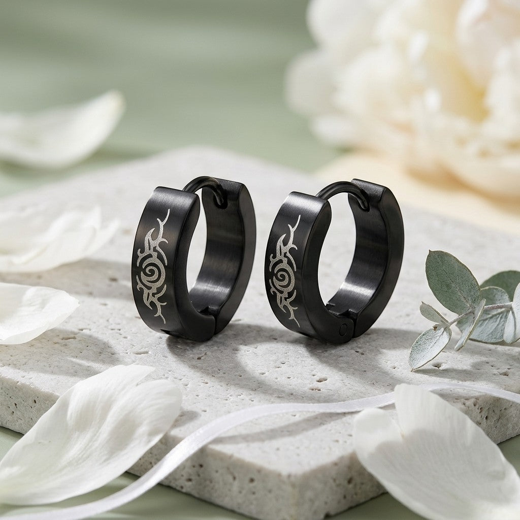 Aramat Jewels black stainless steel huggie hoop earrings with tribal design, 14mm diameter.