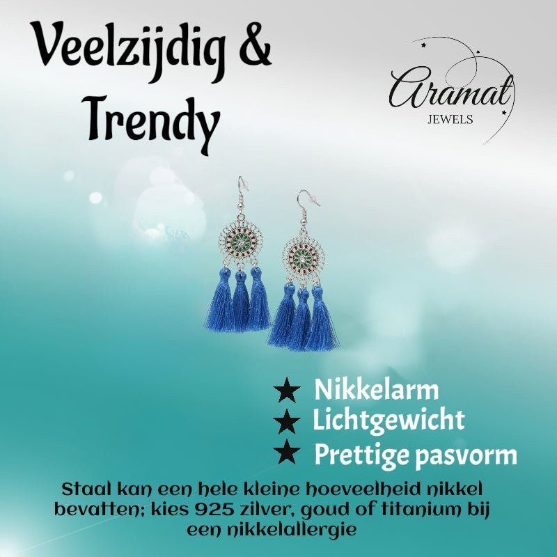 Aramat Jewels blue boho dangle earrings featuring three tassel drops and stainless steel accents on a light background.