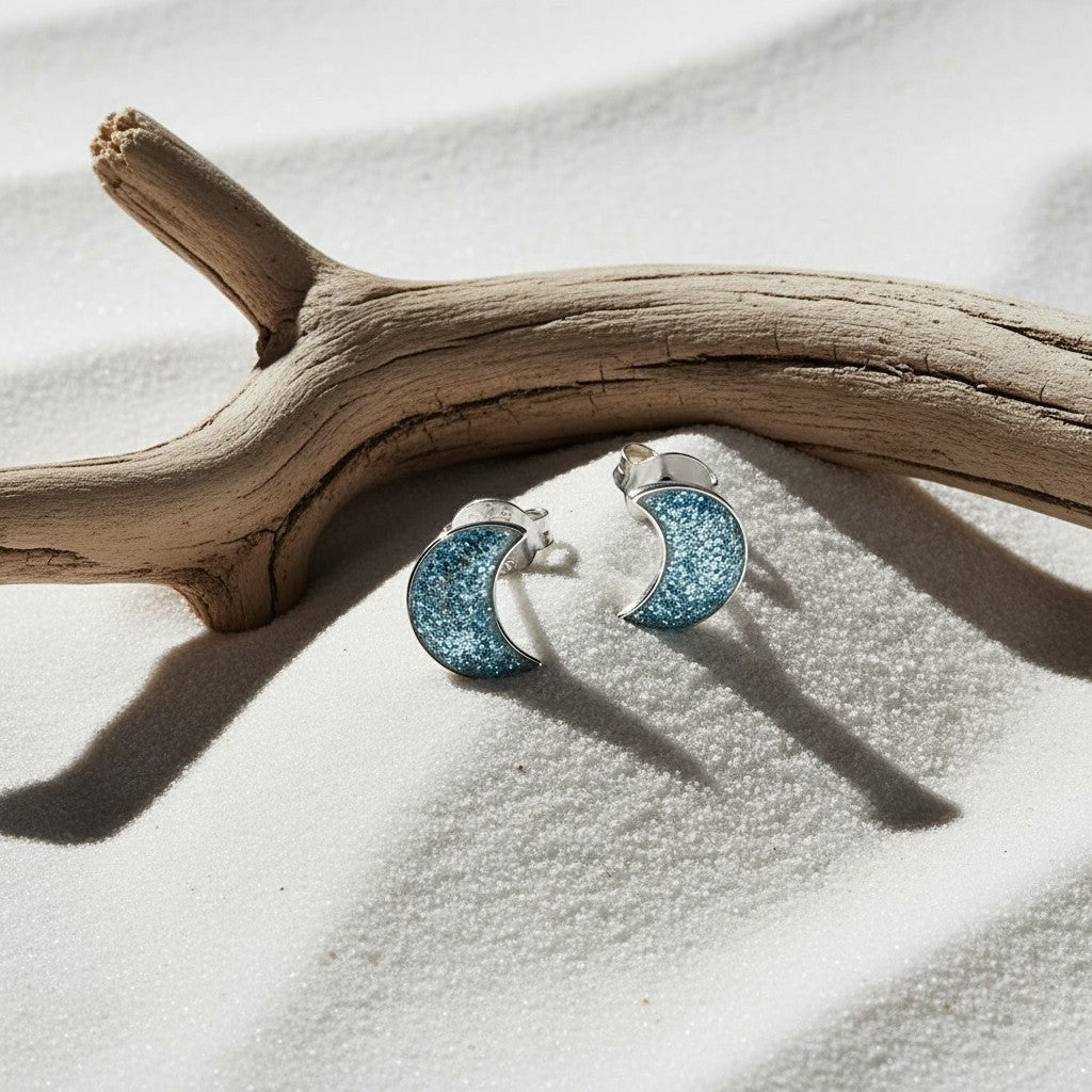 Aramat Jewels 925 sterling silver crescent moon stud earrings with blue glitter inlay, 6x3mm.