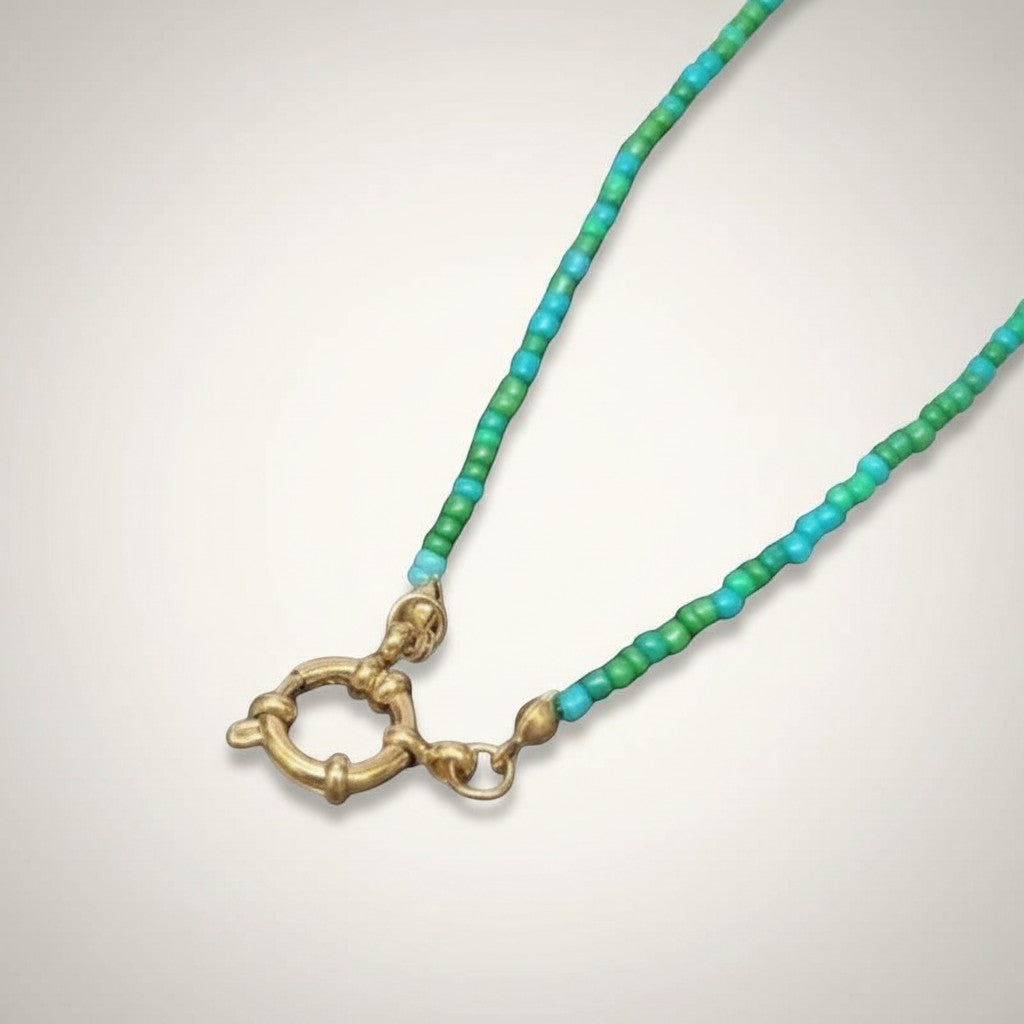Aramat Jewels blue and green beaded charm necklace with gold clasp. Handmade RVS and Rocailles.
