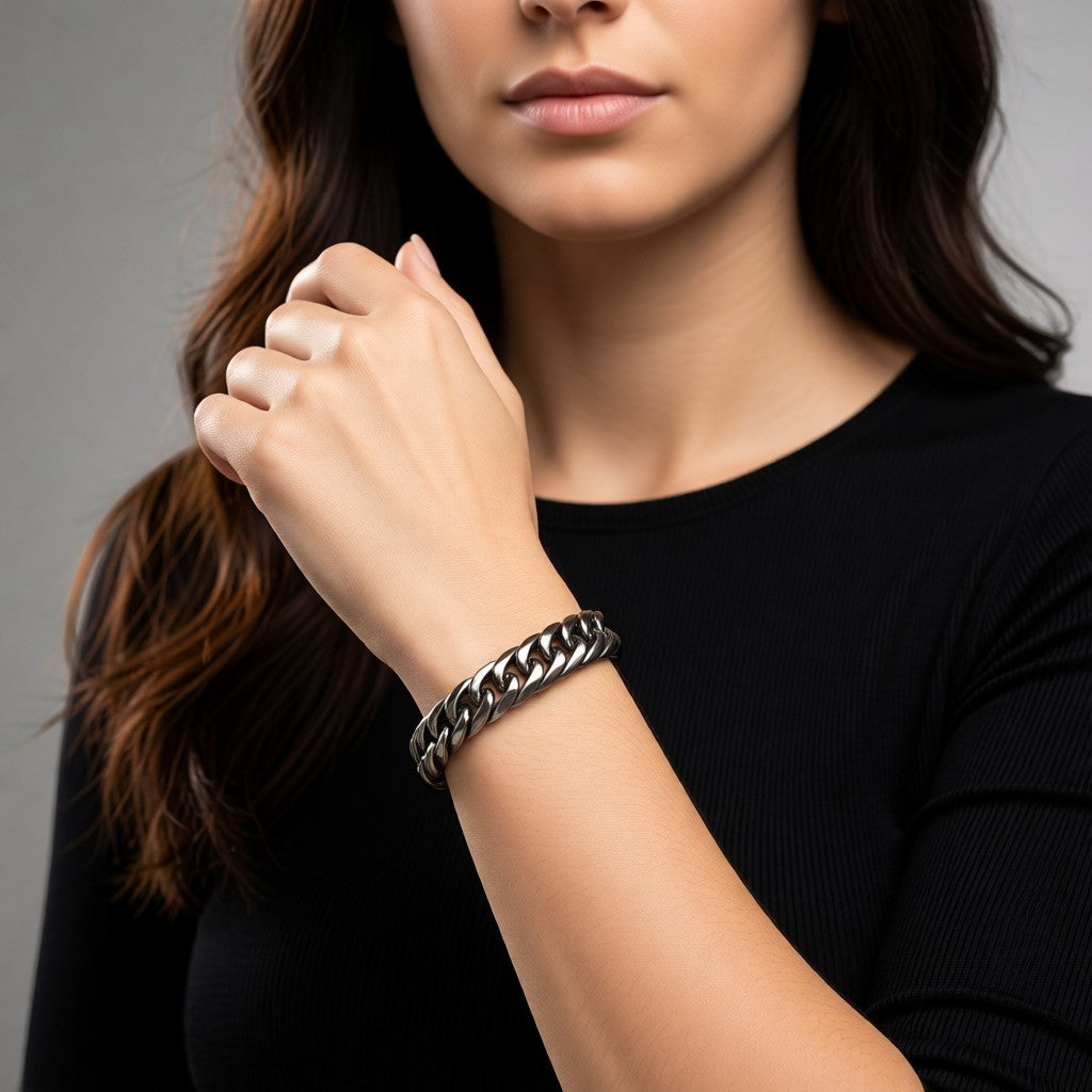 Aramat Jewels brede zilverkleurige stalen gourmet armband van 14mm breed en 22cm lang.