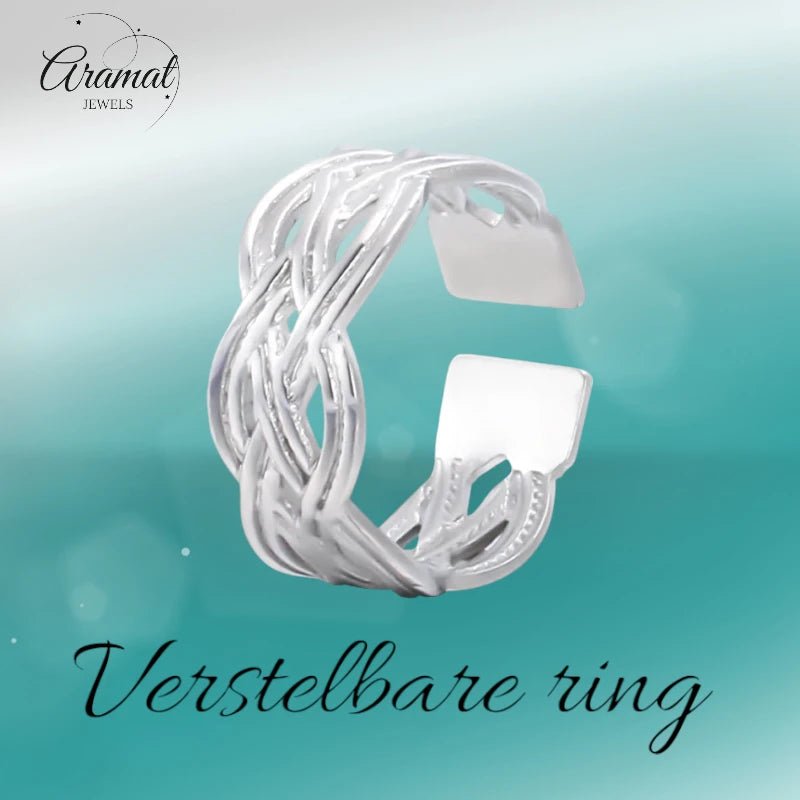 Aramat Jewels adjustable silver-colored stainless steel ring featuring an intricate Celtic braided knot design.