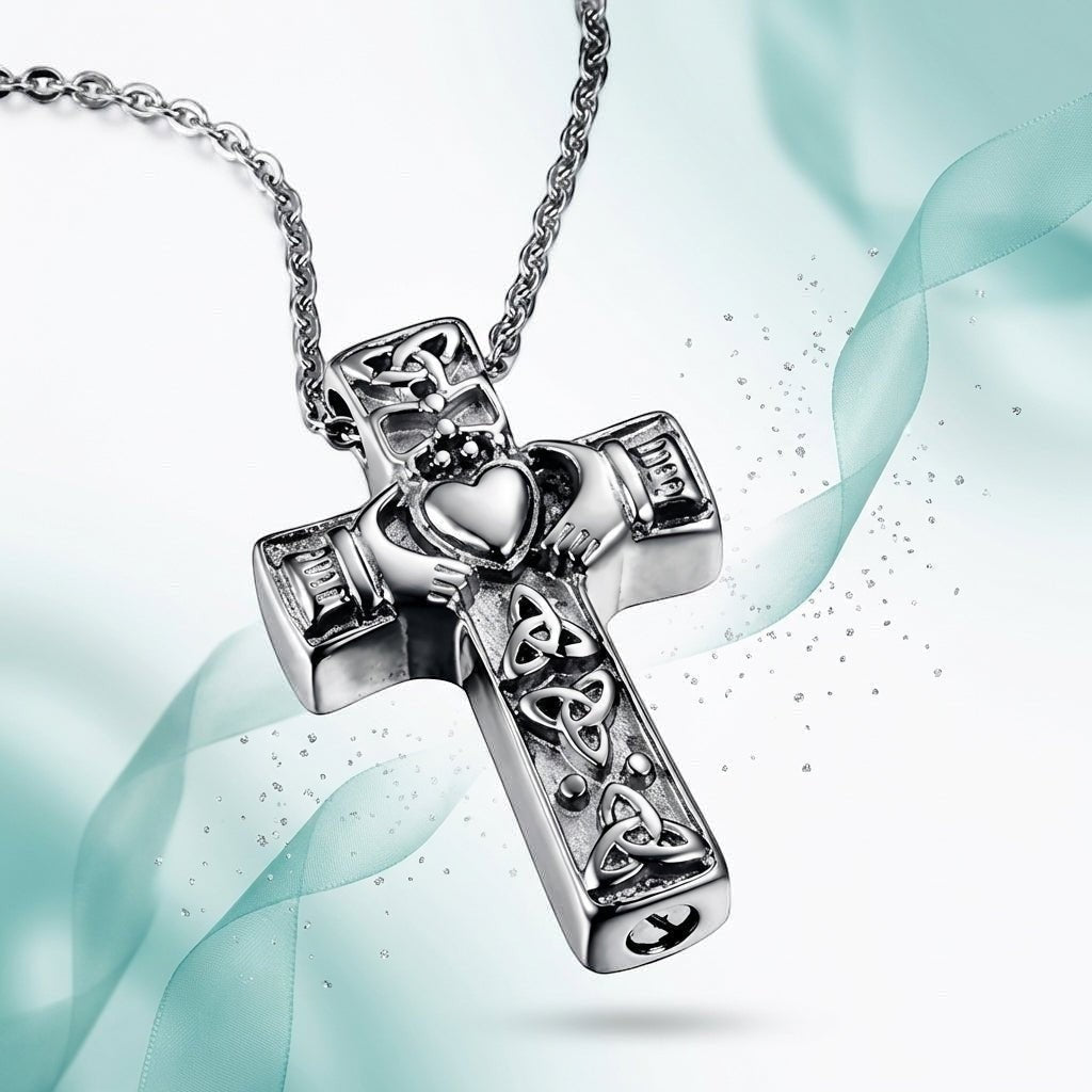 Aramat Jewels silver-tone Celtic cross cremation pendant with intricate knotwork and a Claddagh design, made of stainless steel.