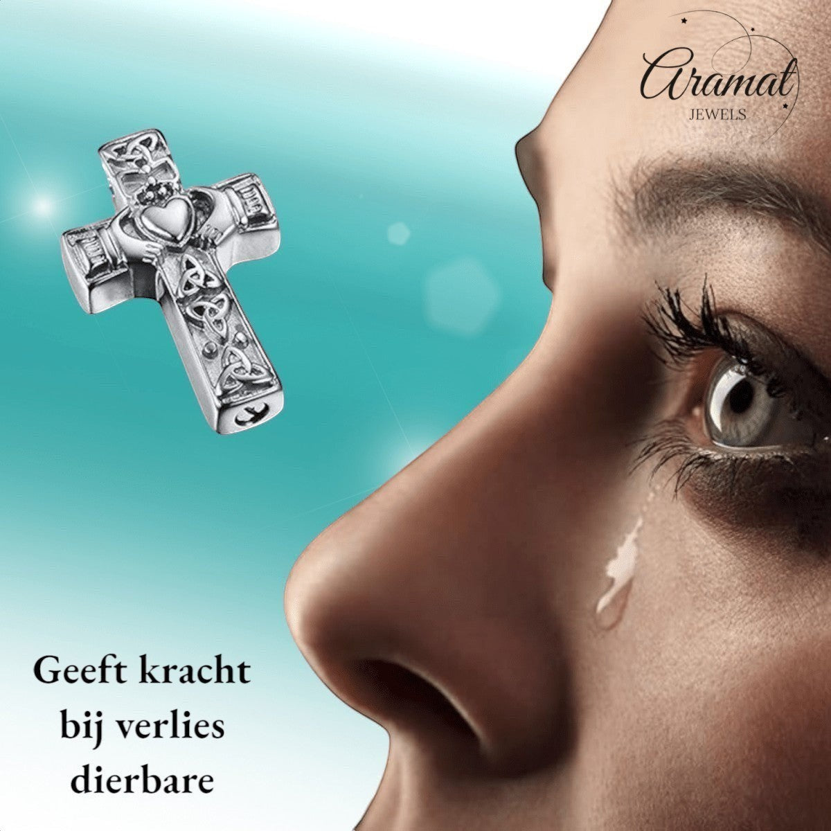 Aramat Jewels silver-tone Celtic cross pendant with black enamel details, 40x25mm, featuring intricate knotwork and a heart emblem.