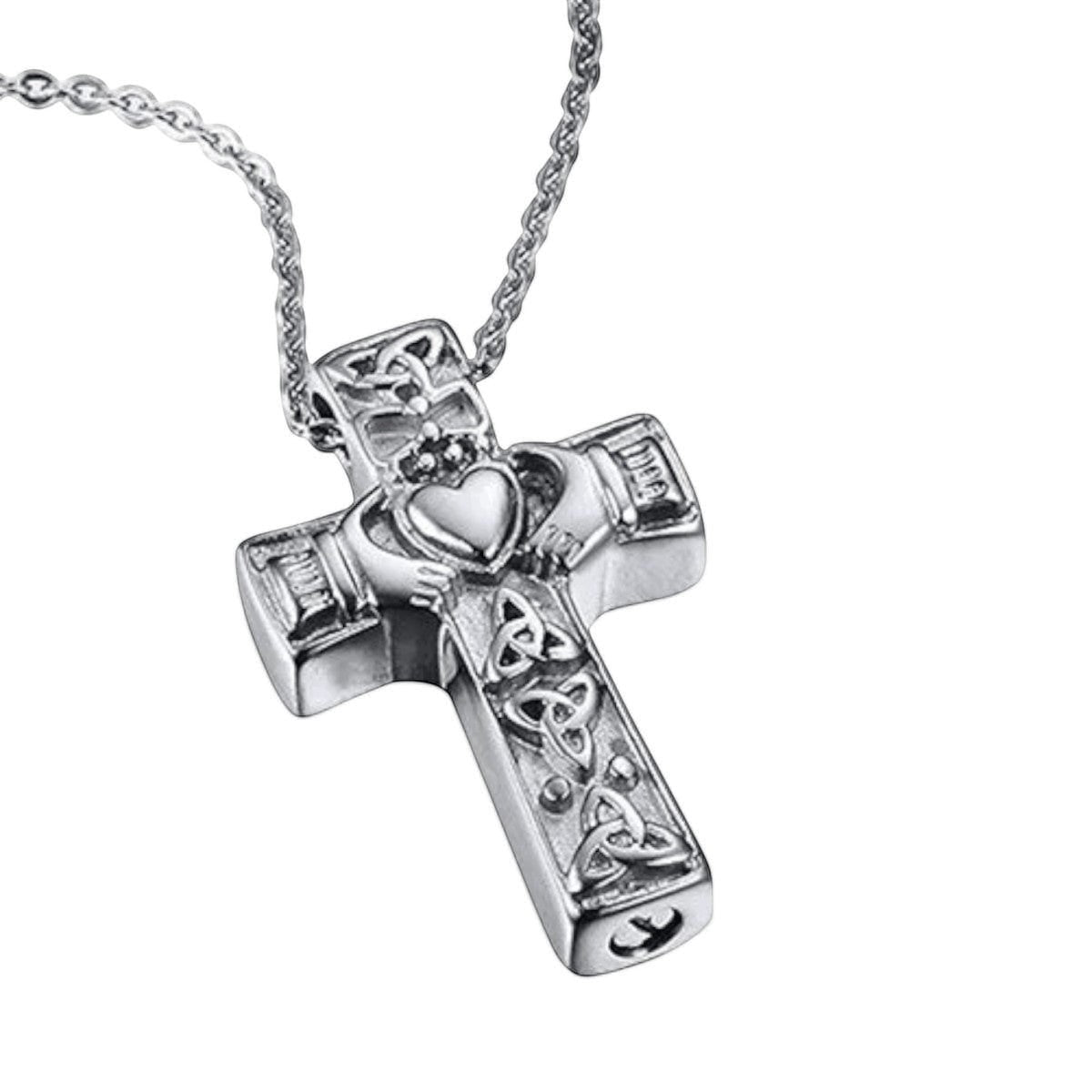 Aramat Jewels silver-tone Celtic cross urn necklace with intricate knotwork and a Claddagh design, made of stainless steel.