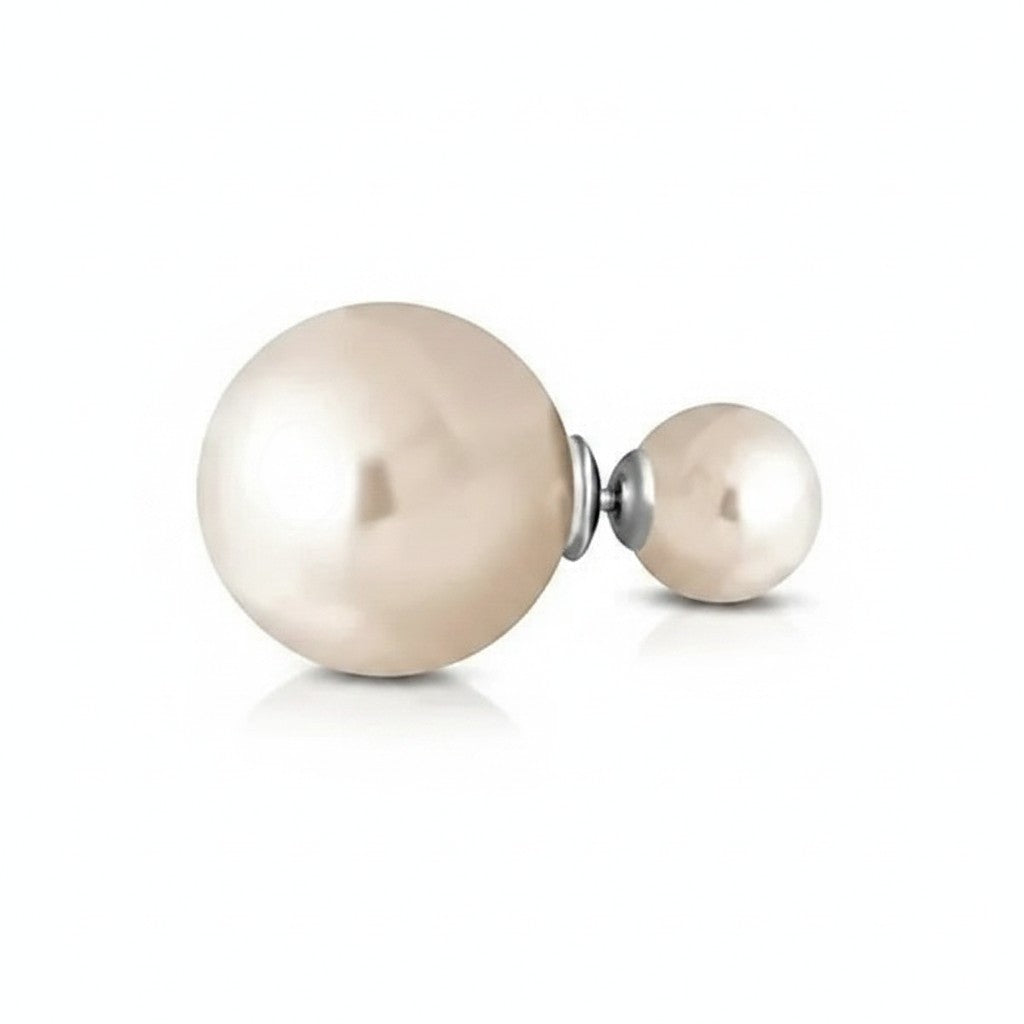Aramat Jewels double pearl stud earrings featuring a large and small cream-colored synthetic pearl on a silver post.