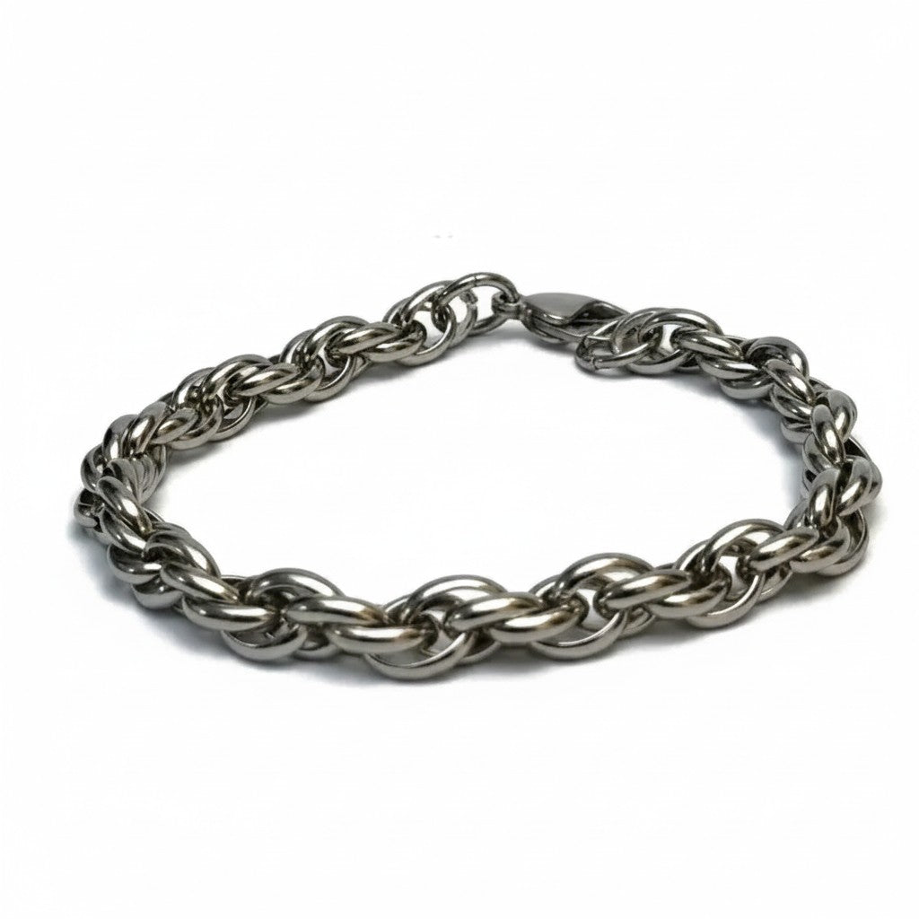 Aramat Jewels zilverkleurige gevlochten stalen armband van 22 cm met een breedte van 7 mm en een karabijnsluiting.