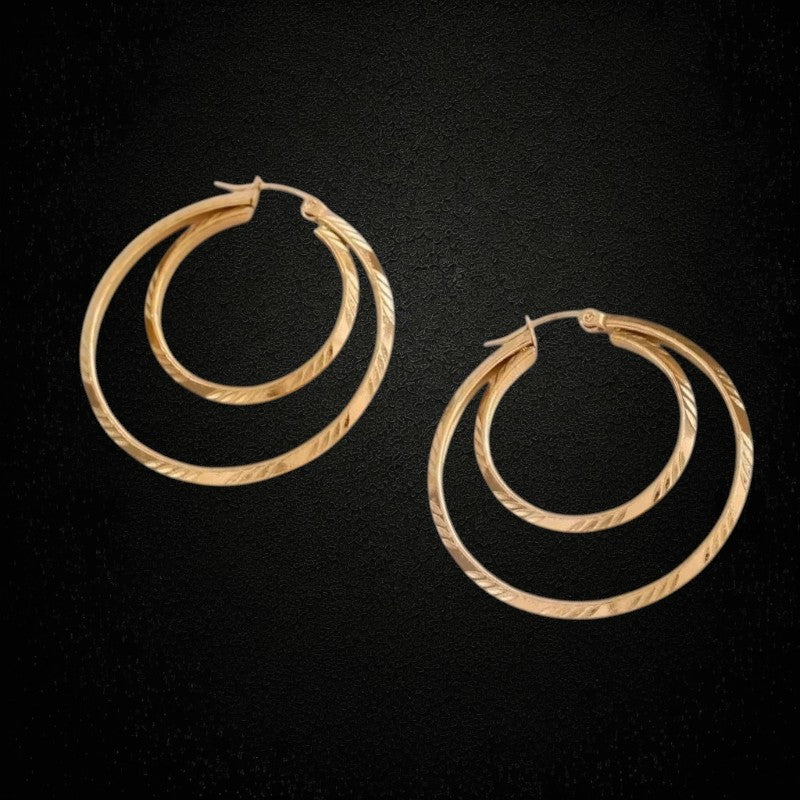 Aramat Jewels large 45mm gold-tone stainless steel 2-in-1 hoop earrings with a striped design.