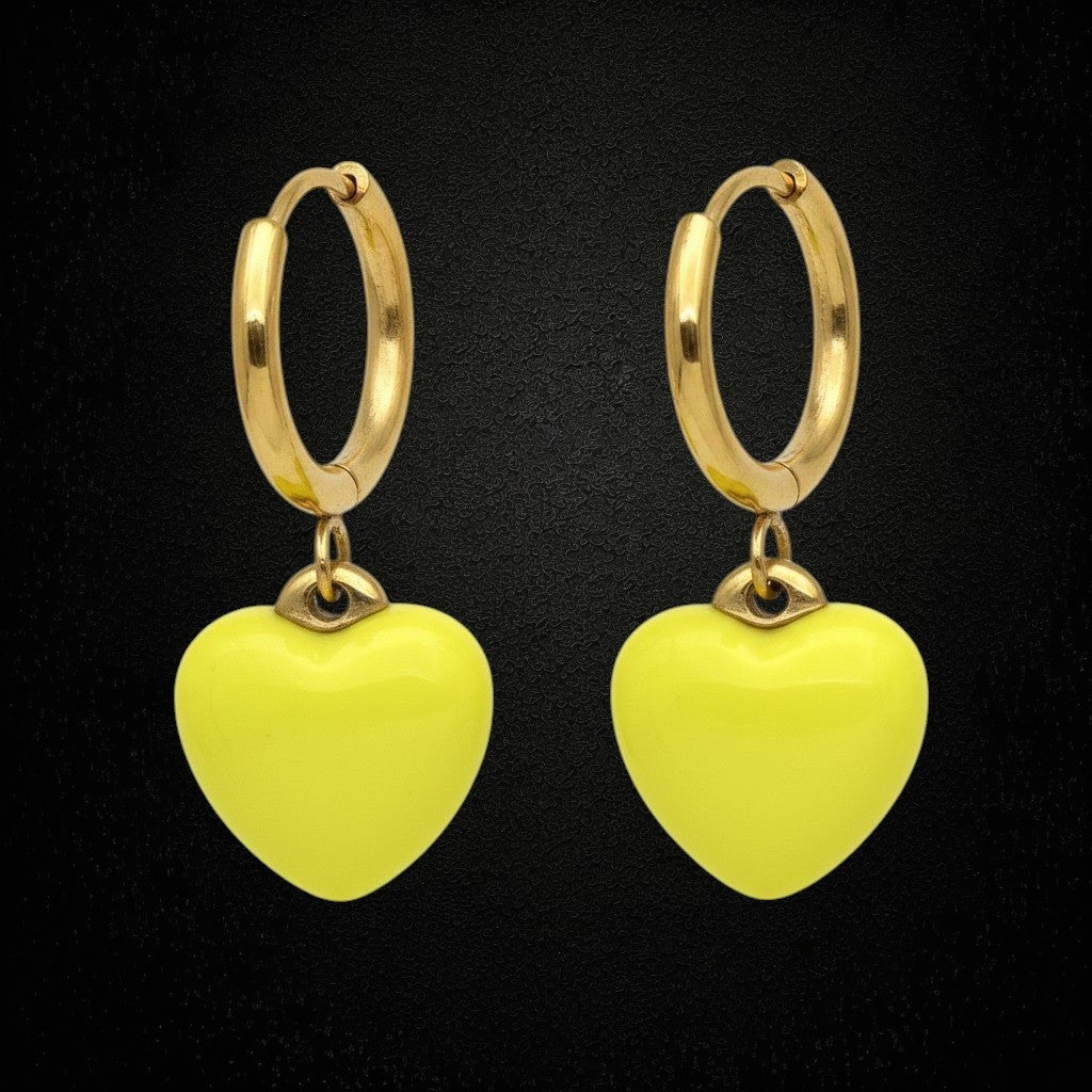 Aramat Jewels gold-colored stainless steel huggie hoop earrings with a yellow enamel heart charm.