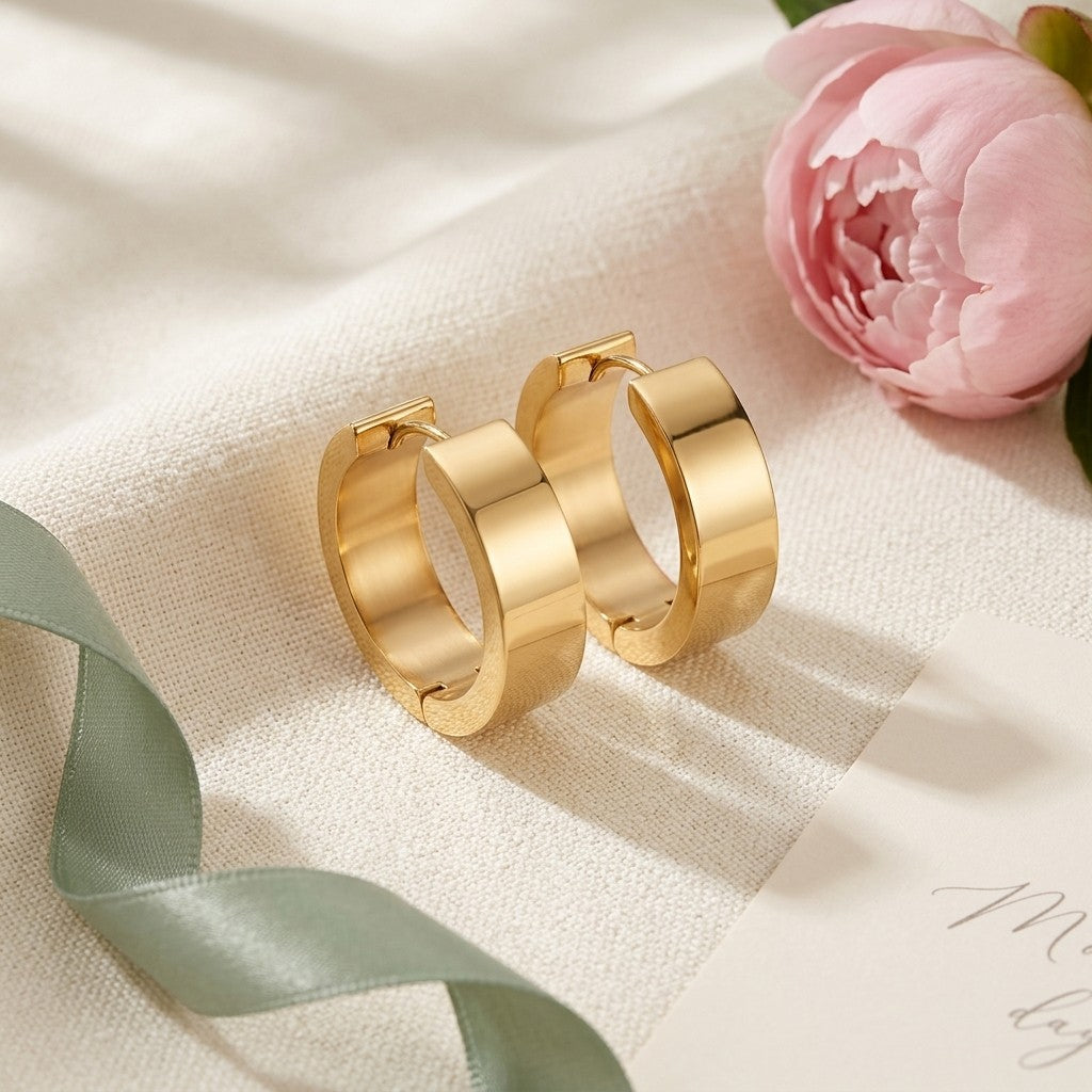 Aramat Jewels gold-coloured smooth stainless steel hoop earrings, 20mm diameter, 7mm width, classic and timeless style.