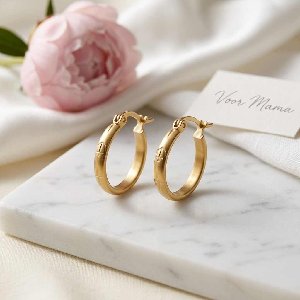 Aramat Jewels gold-coloured 20mm stainless steel hoop earrings with anchor and star motif.