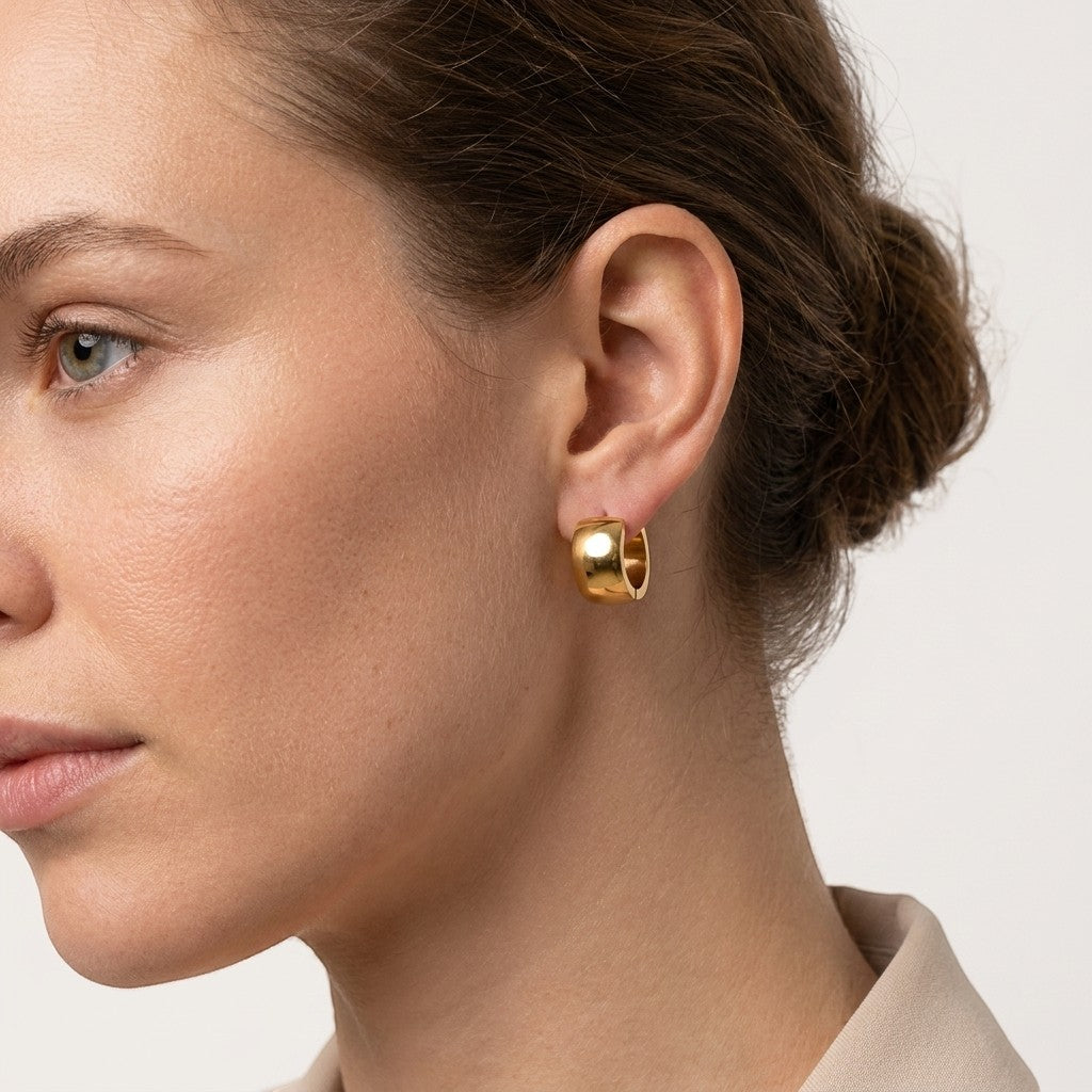 Aramat Jewels gold-tone stainless steel smooth hoop earrings, 13x7mm, with a polished finish.