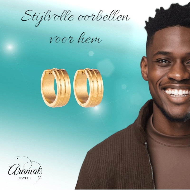 Aramat Jewels gold-tone stainless steel hoop earrings with two raised stripes, worn by a smiling man.