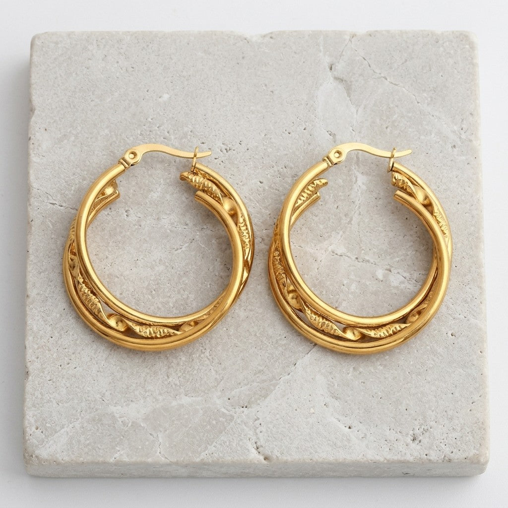 Aramat Jewels triple gold hoop earrings with a twisted textured detail, 30x7mm.