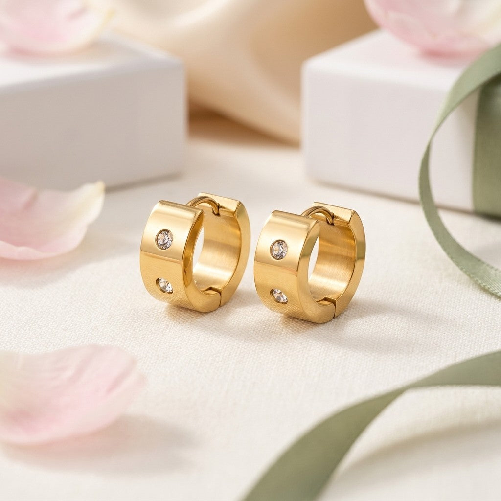 Aramat Jewels gold-tone stainless steel hoop earrings with double cubic zirconia stones, 13mm or 20mm diameter.
