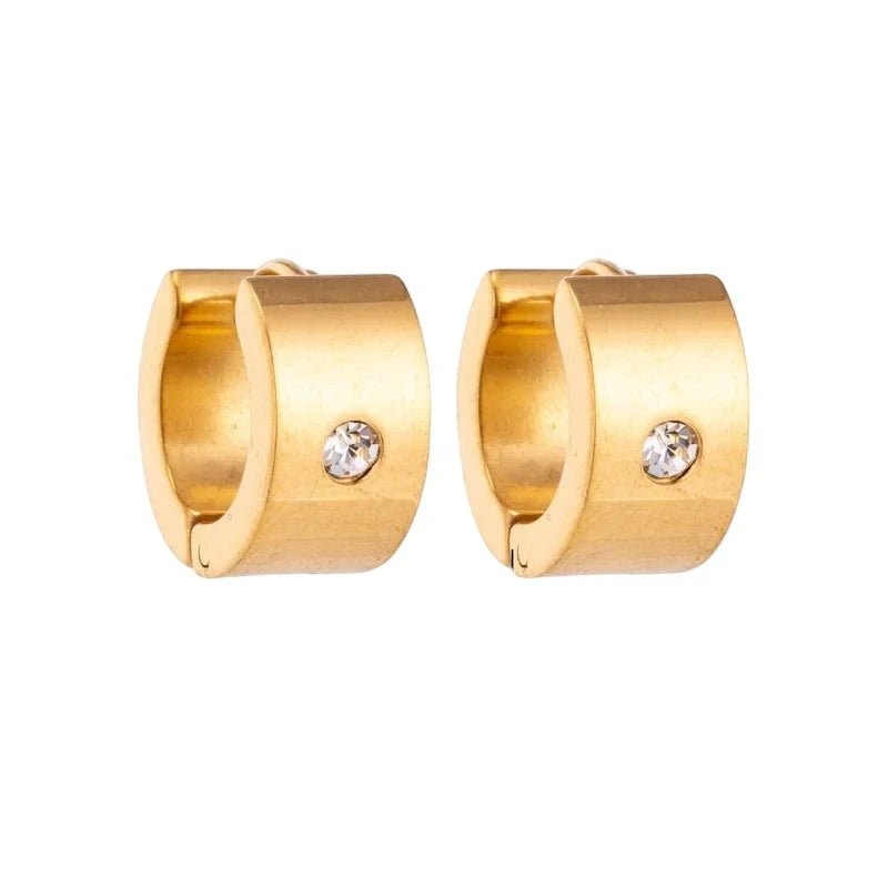 Aramat Jewels gold-tone stainless steel huggie hoop earrings with a single clear cubic zirconia stone.