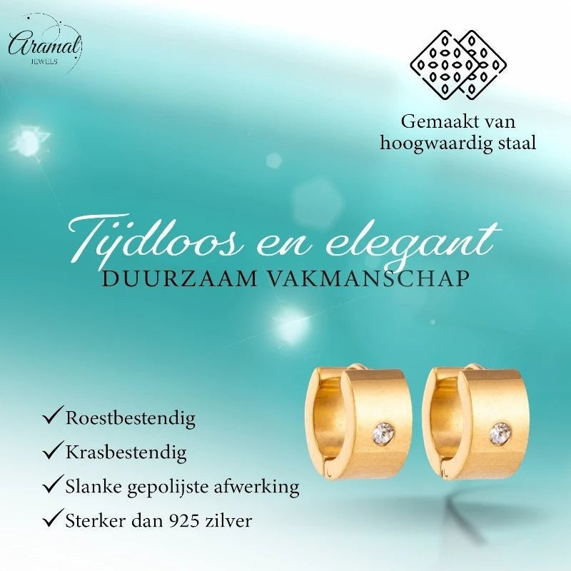 Aramat Jewels gold-coloured wide stainless steel huggie hoop earrings with a single clear zirconia stone.