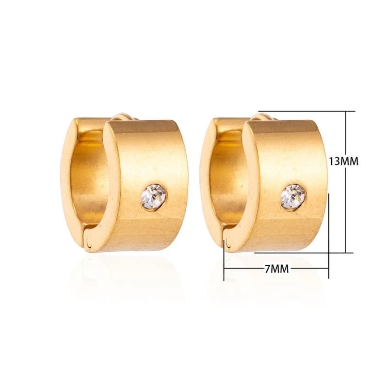 Aramat Jewels gold-tone stainless steel huggie hoop earrings with a single clear cubic zirconia stone.