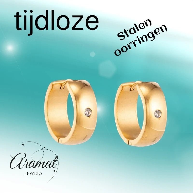 Aramat Jewels gold-tone stainless steel huggie hoop earrings with a central clear cubic zirconia stone.