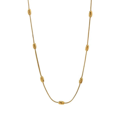 Aramat Jewels gold-colored stainless steel necklace featuring delicate oval beads on a fine chain for women.