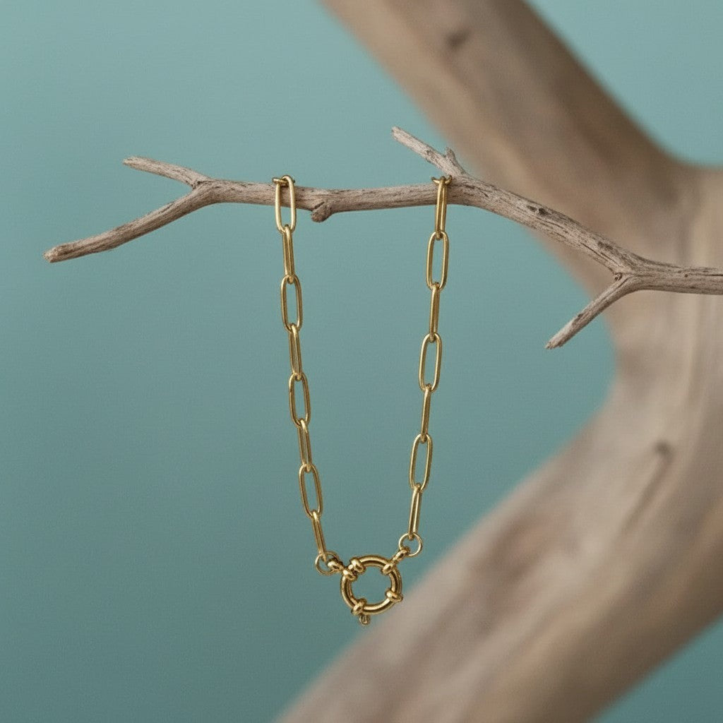 Aramat Jewels gold-tone stainless steel paperclip chain necklace with a circular clasp. The necklace is 4mm wide and handmade.