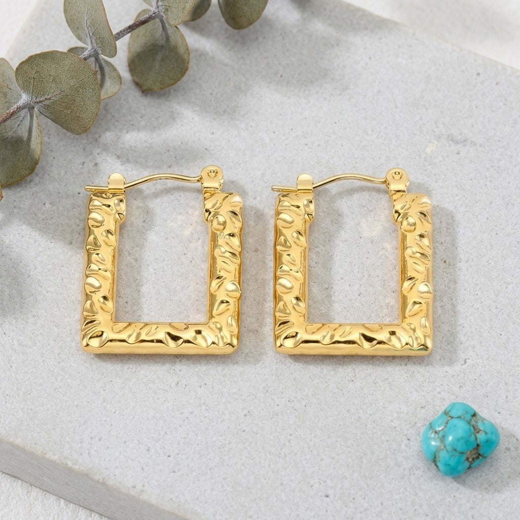 Aramat Jewels gold rectangular hoop earrings with textured stripes, 26x18mm, modern geometric design.