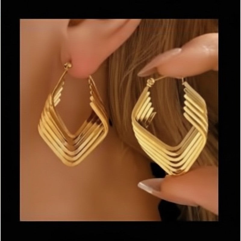 Aramat Jewels gold-tone stainless steel square hoop earrings with 6 stacked hoops, 39mm high.