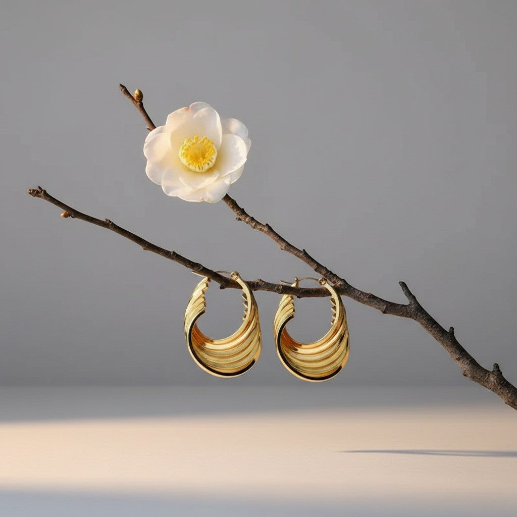 Aramat Jewels gold-tone stainless steel square hoop earrings with a layered design, 37mm high.