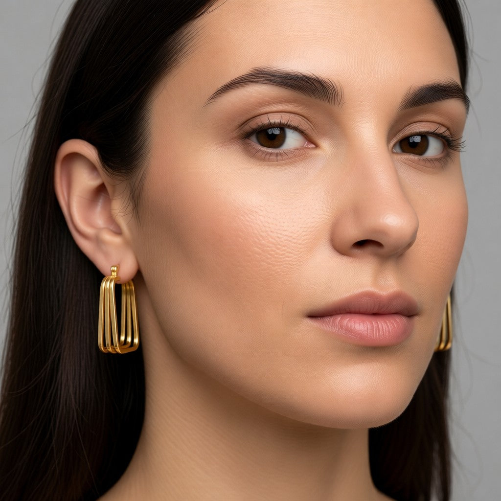 Aramat Jewels gold-tone stainless steel square statement earrings with a 3-in-1 design, 27mm.