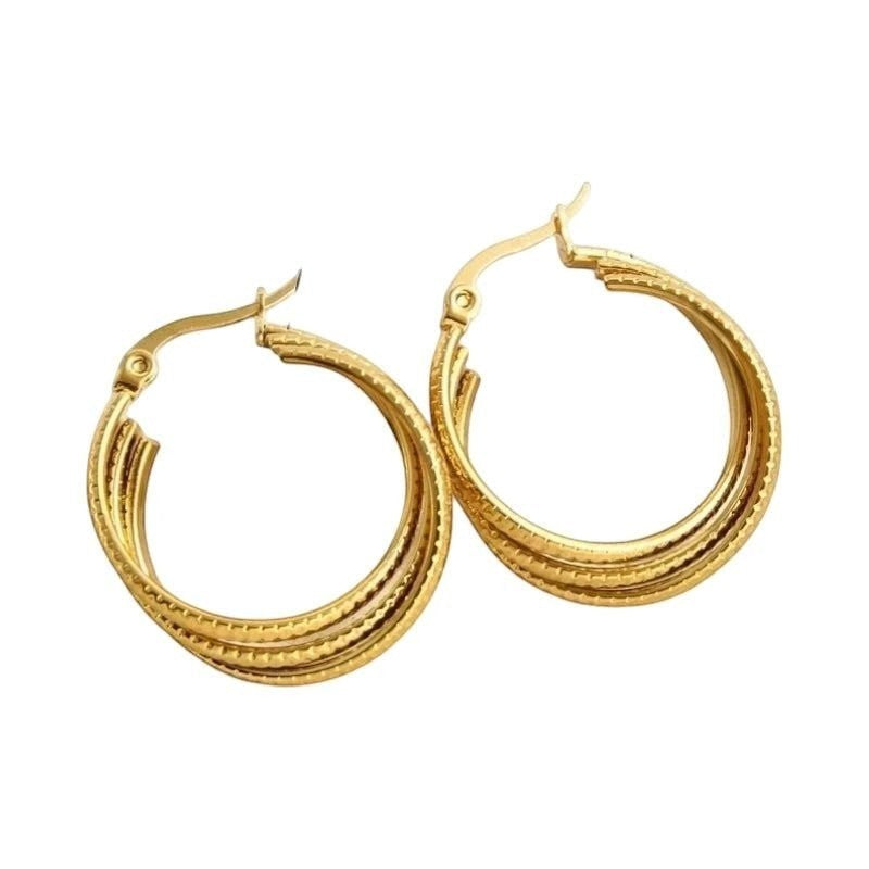 Aramat Jewels gold-tone stainless steel triple hoop earrings with a striped pattern, 25mm diameter.